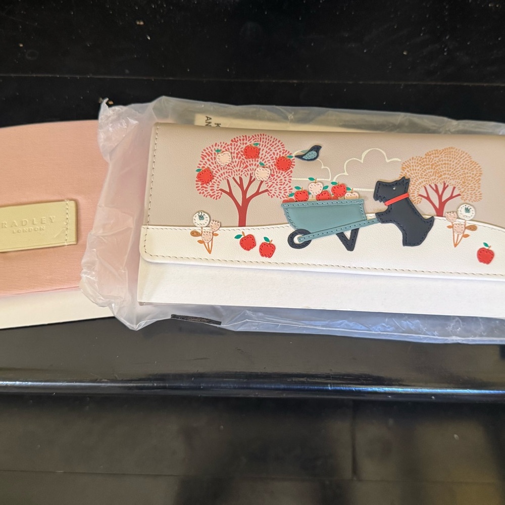 Radley London Cream Wallet with Playful Dog Design